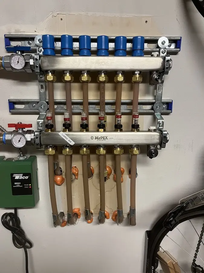 Plumber performing Water Heater Repair at a residential property in Nanticoke